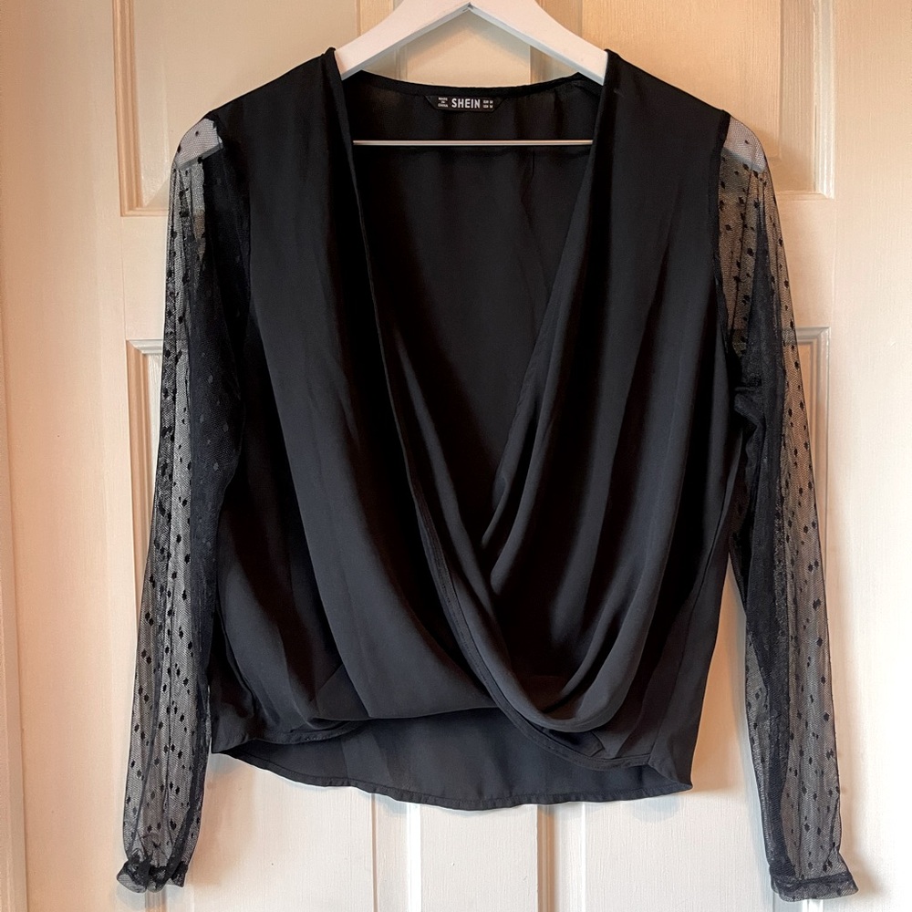 Deep Cut Black top with lace sleeves